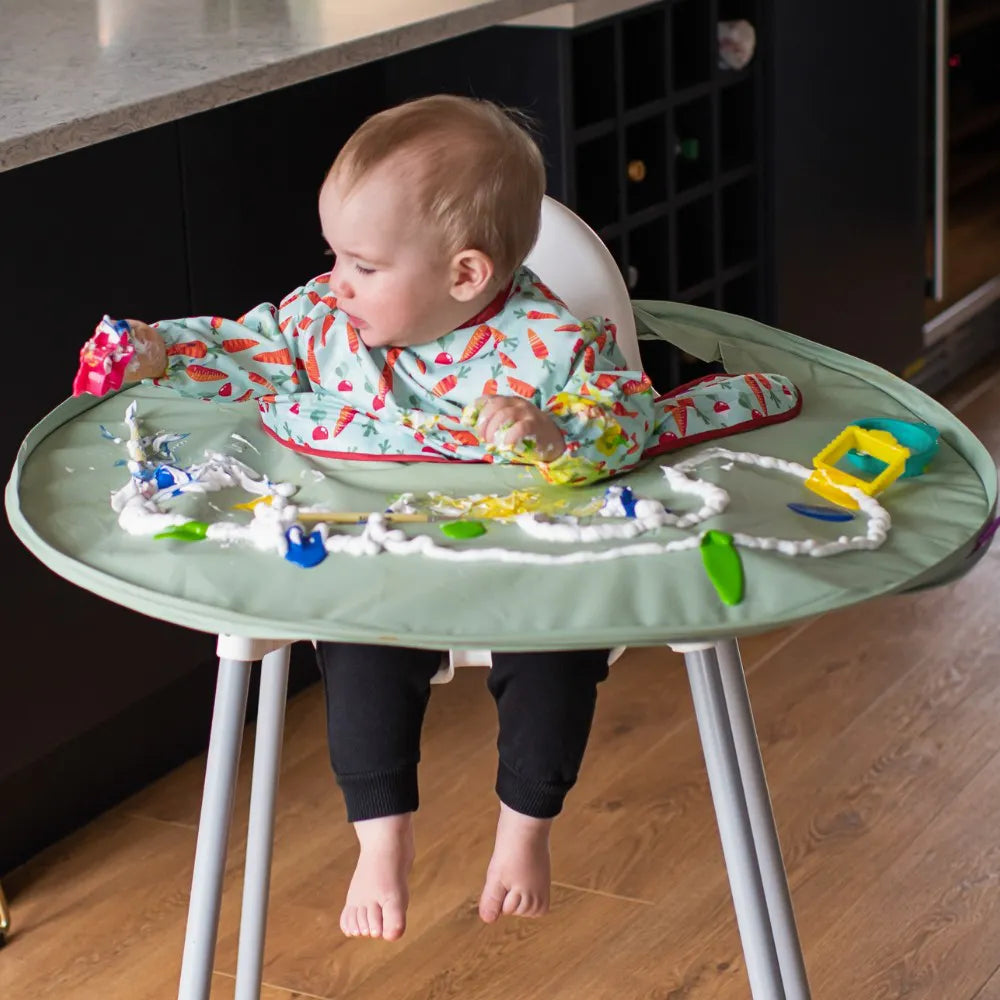 Tidy Tot - The face you pull when you know your food's on the way 🙌  @the_wijsvelds uses our Bib & Tray Kit in sage green 🥕 Take a further look  here